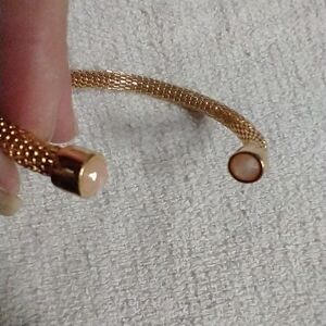 Goldtone mesh cuff bracelet pink accents